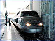 Electric high speed low axle load intercity passenger train needs wide curves, tolerates steep gradients